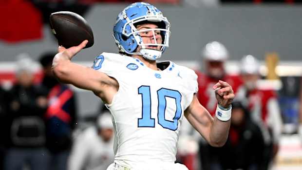 Nov 25, 2023; Raleigh, North Carolina, USA; North Carolina Tar Heels quarterback Drake Maye (10) throws a pass against the North Carolina State Wolfpack during the first half at Carter-Finley Stadium.